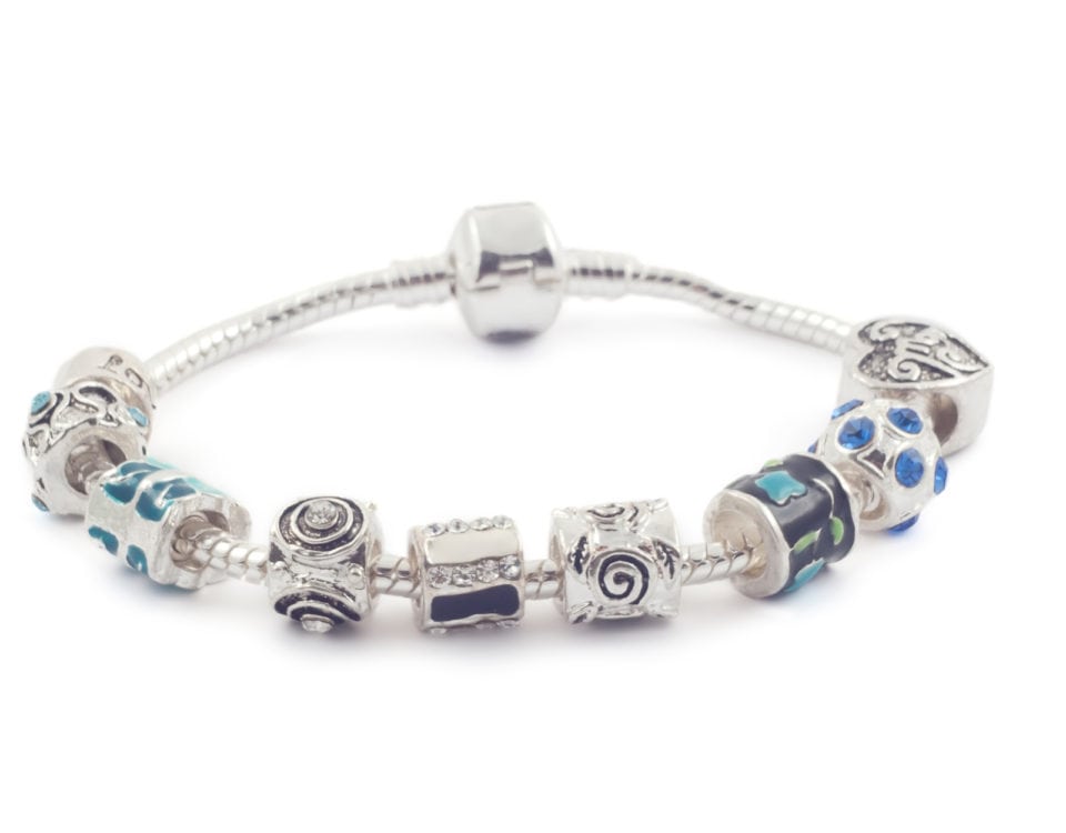 Silver bracelet with beads on white
