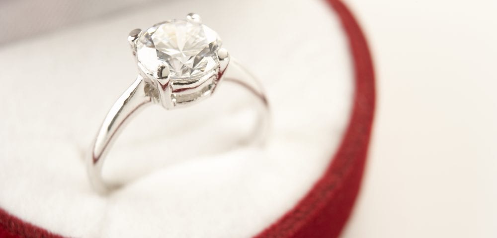 east-west engagement ring setting