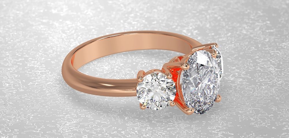 side stone three-stone ring